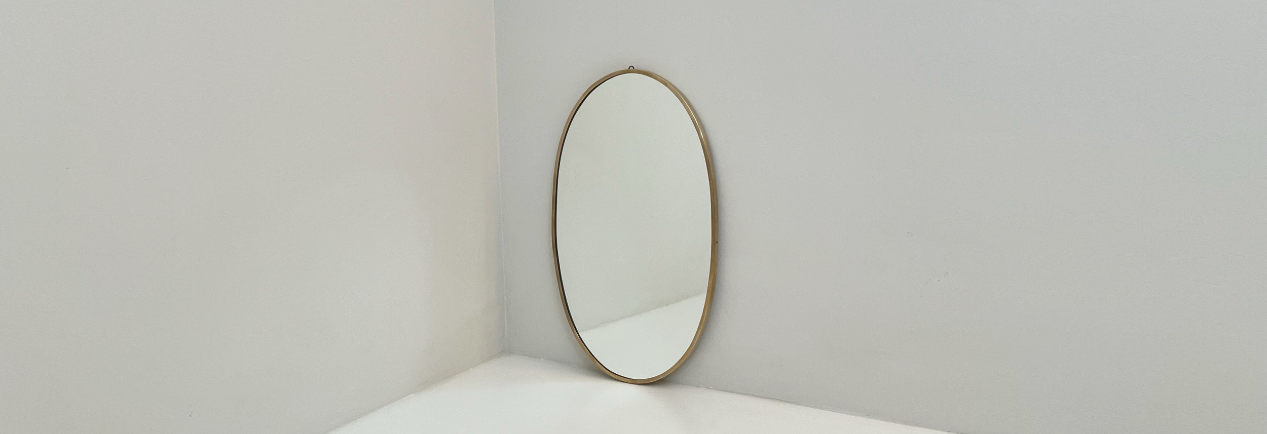 Specchiera ovale anni60 cornice ottone