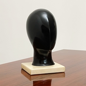 testa metafisica anni60 legno laccato base in pergamena a 111 C